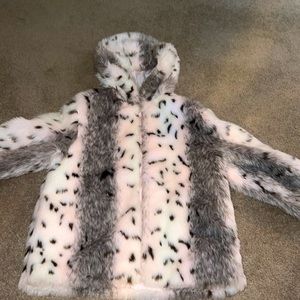 I am selling this white fur coat.